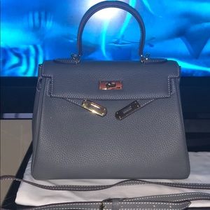 Grey and gold top handle bag